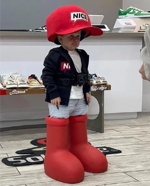 Supreme Kid in Giant Boots