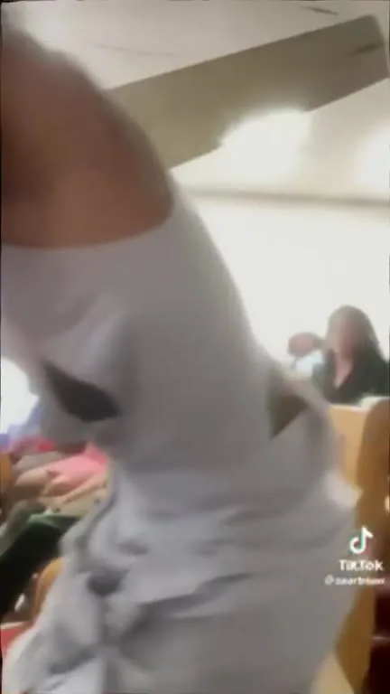 Granny Whooping Her Cousin at Church