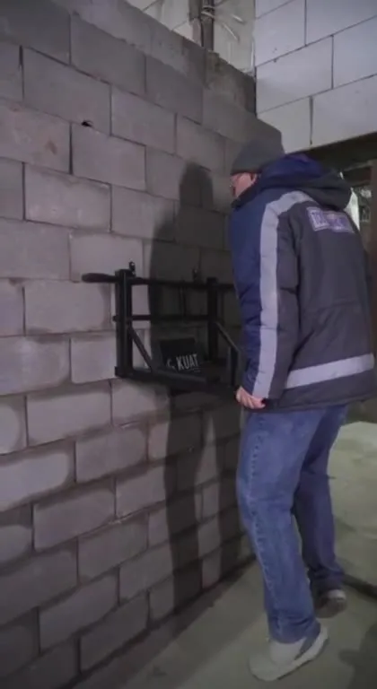 Man Breaks Through the Wall