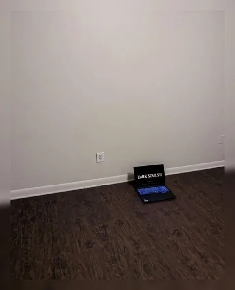 Dark Souls Laptop in Empty Room