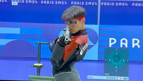 Olympic Shooter Leaning Back
