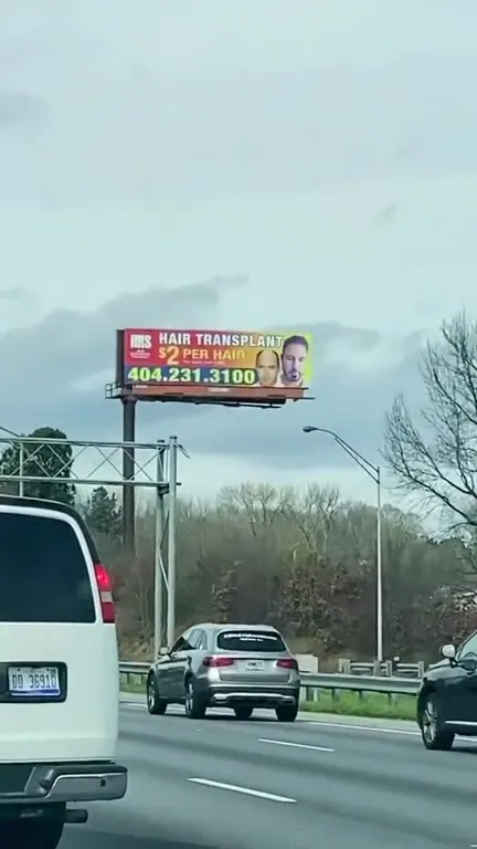 Two-Dollar Hair Transplant Billboard