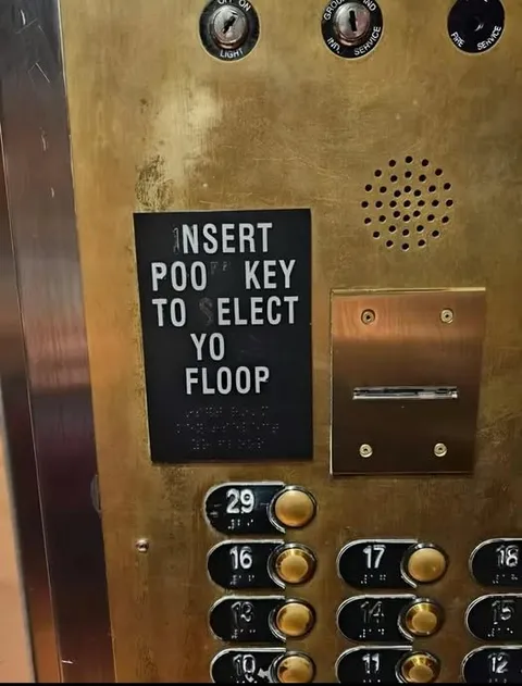 Insert Poo Key Elevator Sign