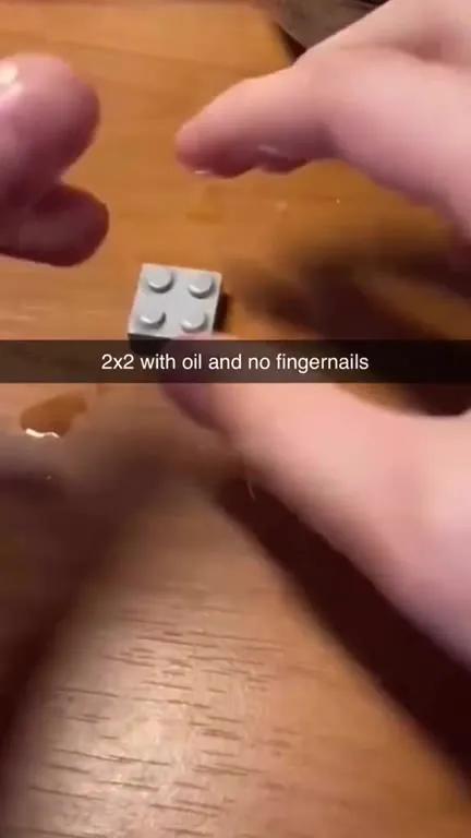 Oily Hands vs LEGO Brick