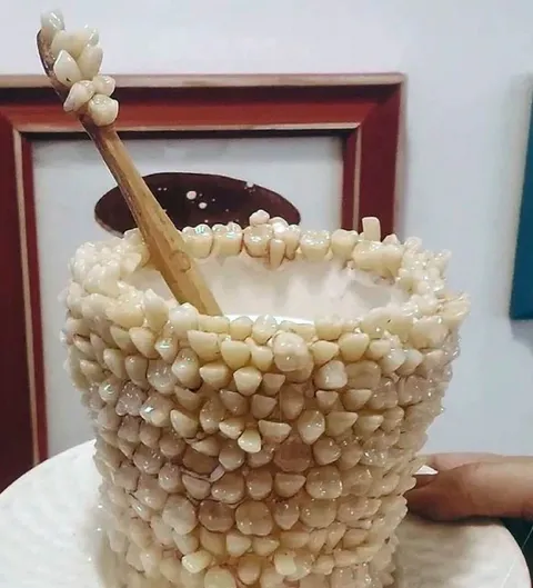 Чашка из зубов