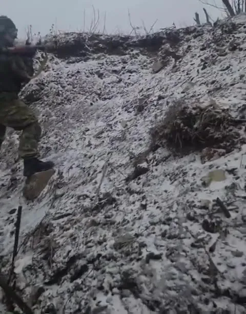 Soldier Climbs Into an Explosion