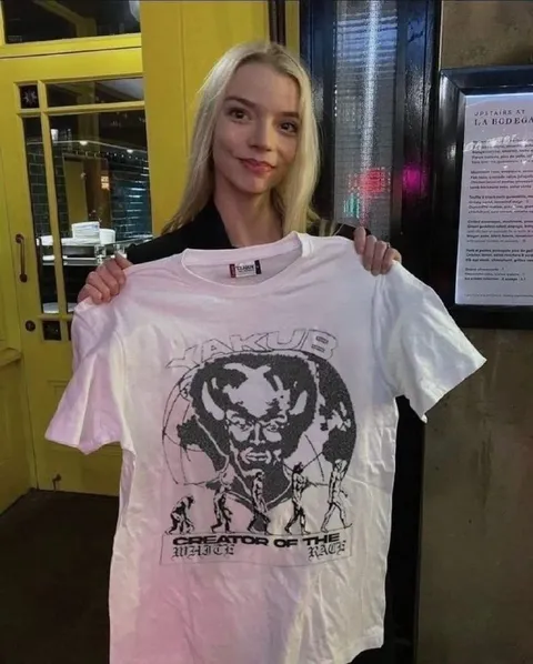 Woman Holding a Strange T-Shirt