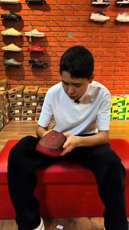 Trying on the Strange Red Shoe