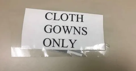 Cloth Gowns Only Sign