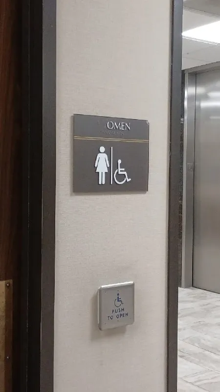 The Missing W Restroom Sign