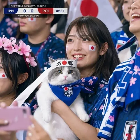 Japan Fan Holds Lucky Cat