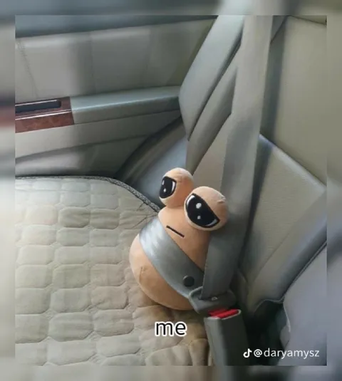 Me strapped in the car