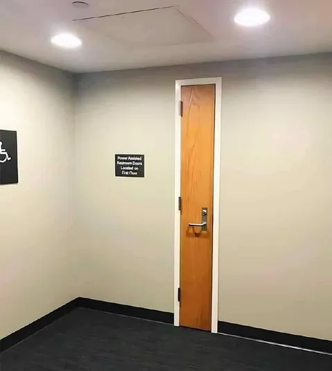 Power-Assisted Restroom Doors Upstairs
