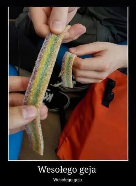 Wesołego geja z cukierkiem