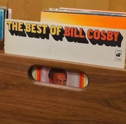 Bill Cosby Peeking Through Album Slot
