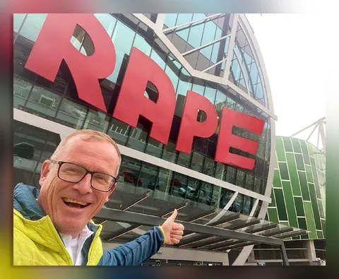 Man Smiling Outside RPE