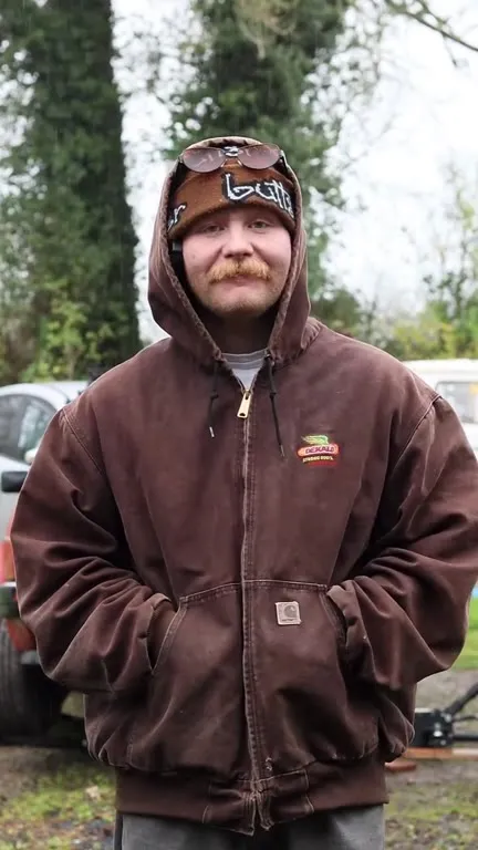Man in a Brown Hoodie