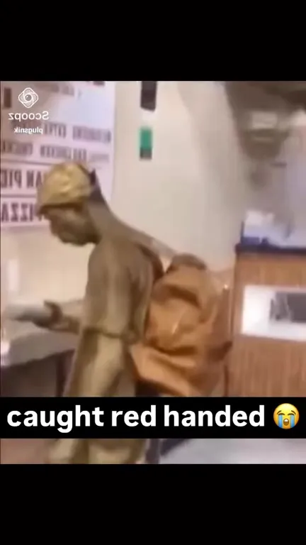 Caught Red Handed Statue