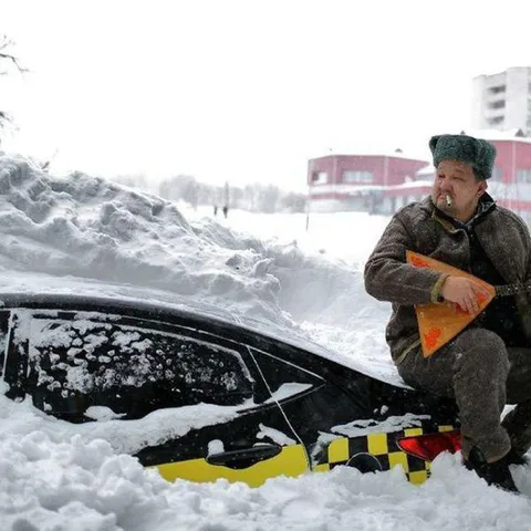 Такси застряло в снегу