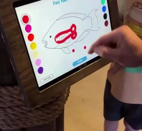 Painting Sunglasses on Aquarium Fish
