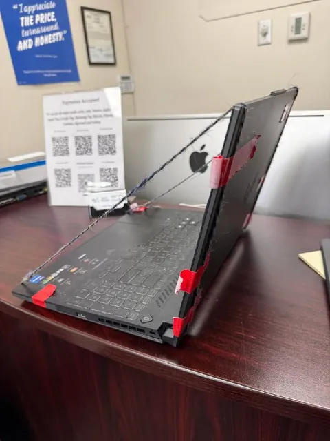 Laptop Chained to the Desk