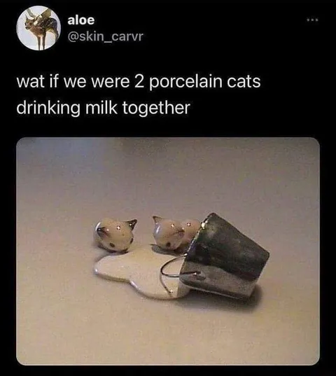 Two Porcelain Cats Drinking Milk