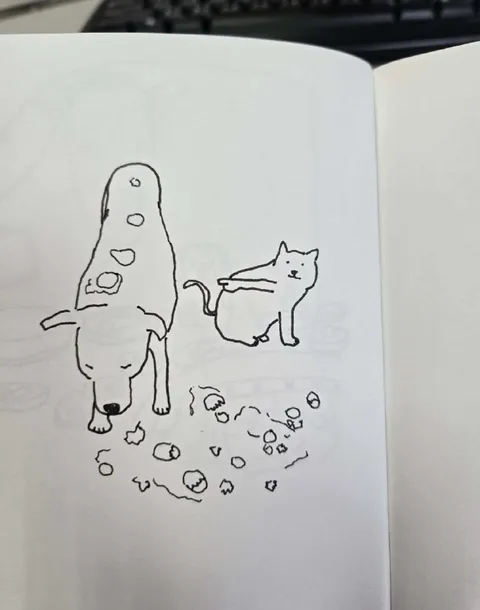 Кот портит рисунок собаки