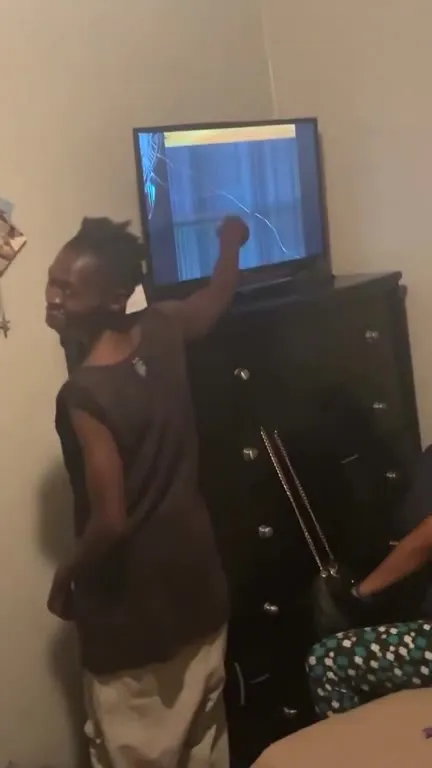 Touching the Cracked TV Screen