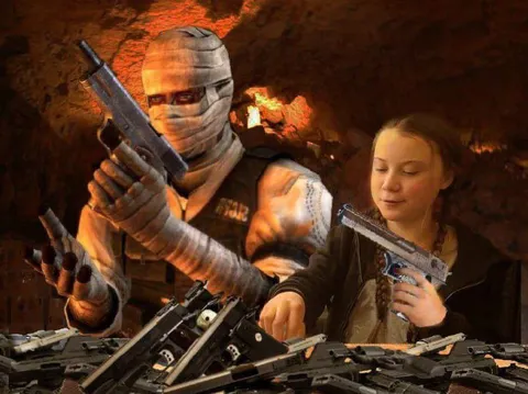 Девочка среди оружия