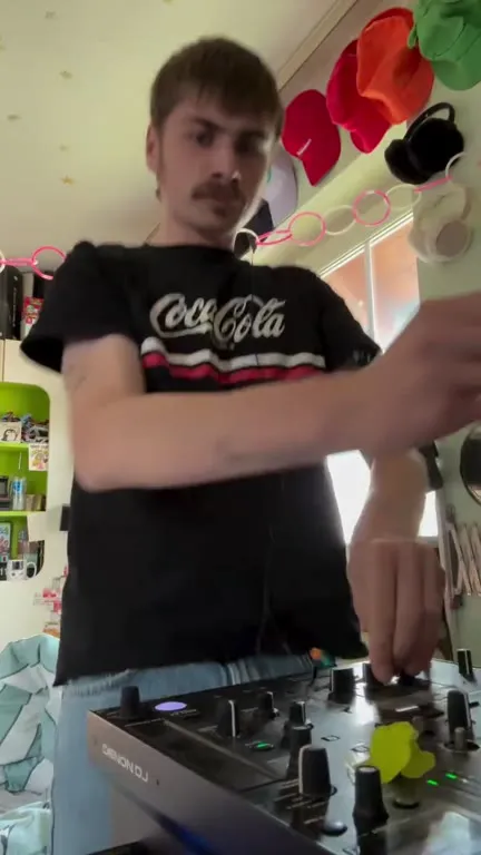 DJ Plays Music with a Tube