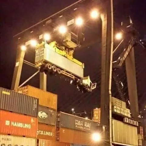 Container Crane Drops Truck