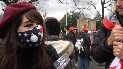Masked Woman at Trump Rally