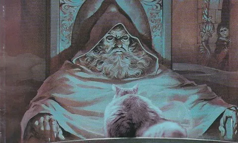 Волшебник и кот в постели