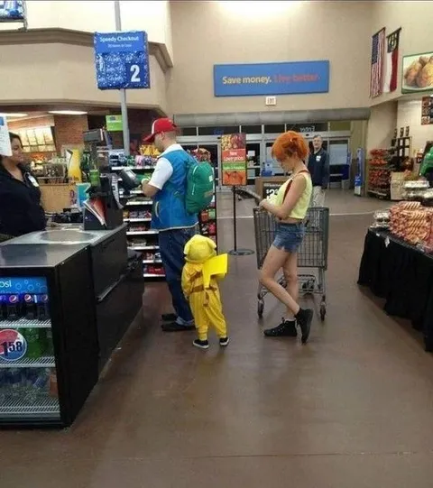 Costumed Family at the Checkout