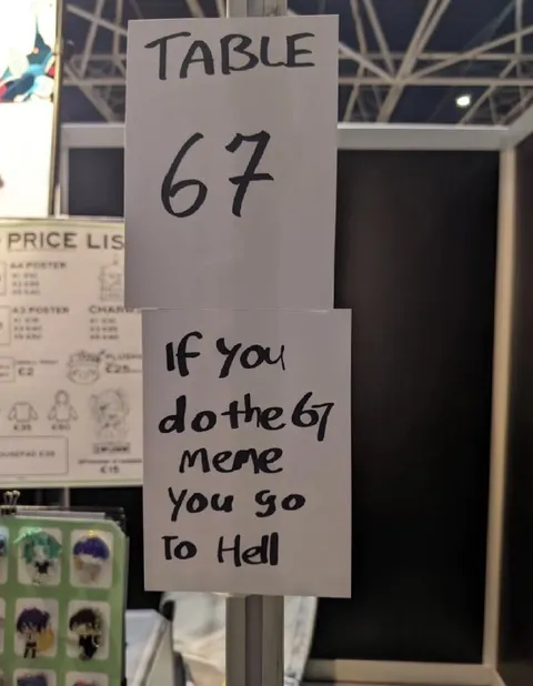 67 Meme Table Sign