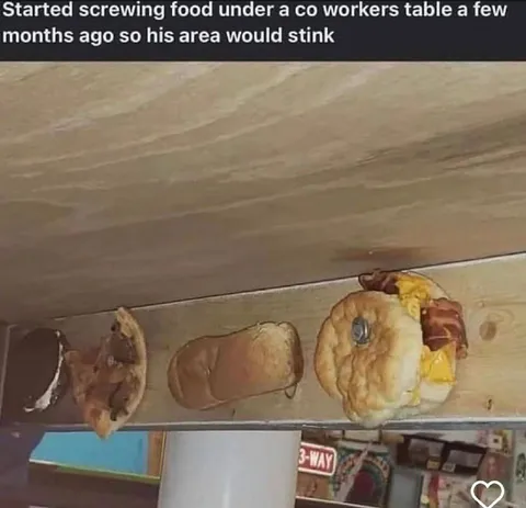 Food Under Coworker's Table