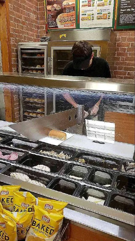 Embarrassed Sandwich Worker