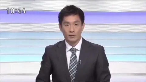 ニュース終了とともに消える男