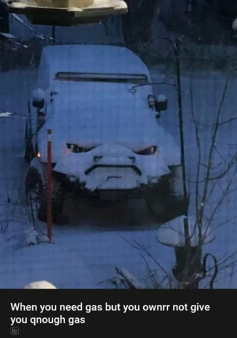 Snowy Car Needs Gas