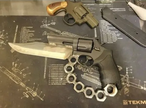 Revolver With Knife Blade and Knuckles