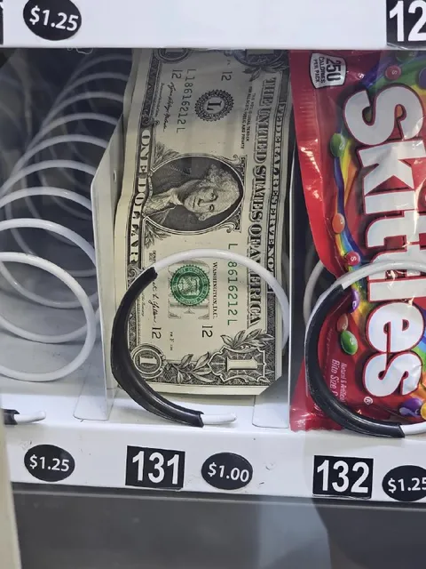 Dollar Bill in the Candy Machine
