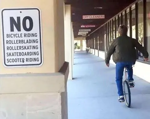 No Bicycle Riding Sign