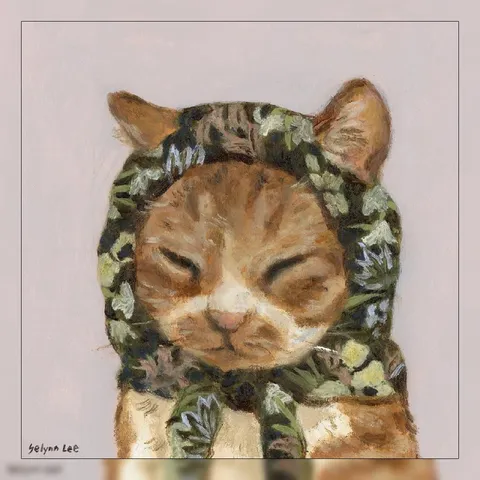 Кот в цветочном венке