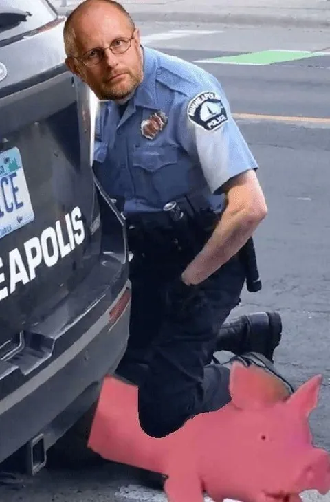 Police Officer Riding a Pig