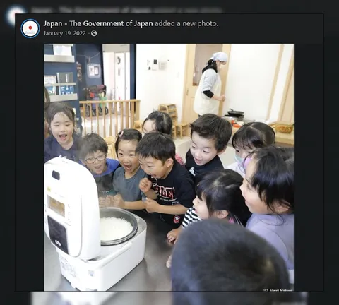 Children Watching a Rice Cooker