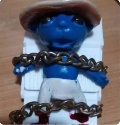 Синий человечек в цепях