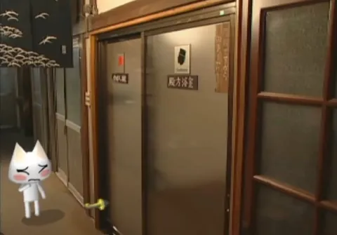 猫がドアを開ける
