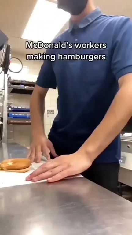 McDonald's Workers Making Hamburgers