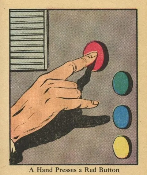 A Hand Presses a Red Button