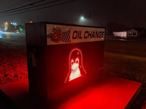 Creepy Red Oil Change Sign
